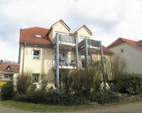 Rückansicht mit Terrasse im Erdgeschoss