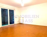Wohnzimmer mit Ausgang zur Terrasse