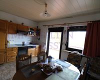 Küche mit Ausgang zur Terrasse