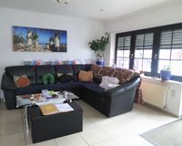 Wohnzimmer mit Ausgang zur Terrasse